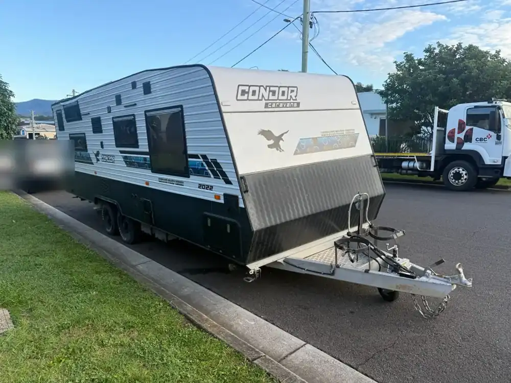 Family caravan parked kerbside, ready for collection