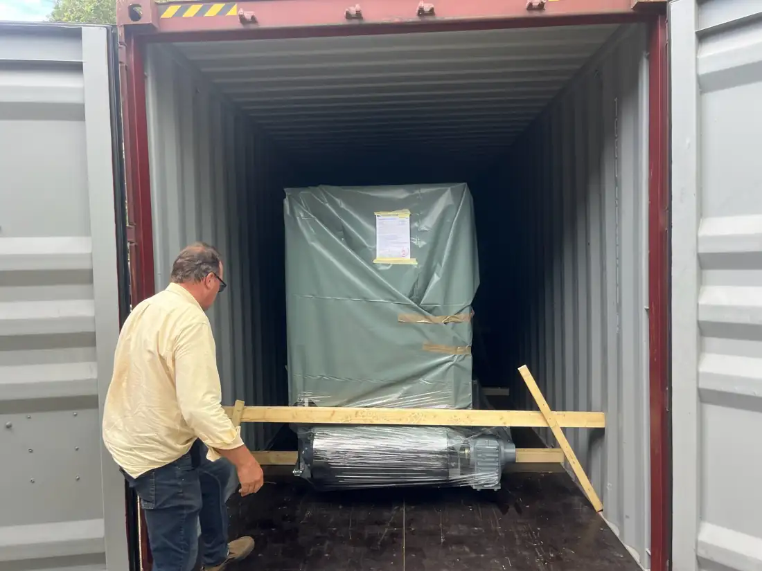 Machinery wrapped, braced and timbered inside a shipping container