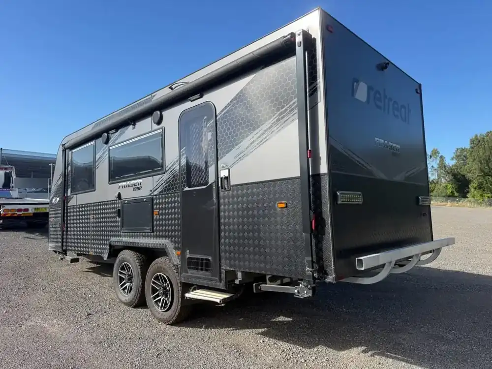 Tandem-axle caravan in a yard before delivery to the terminal